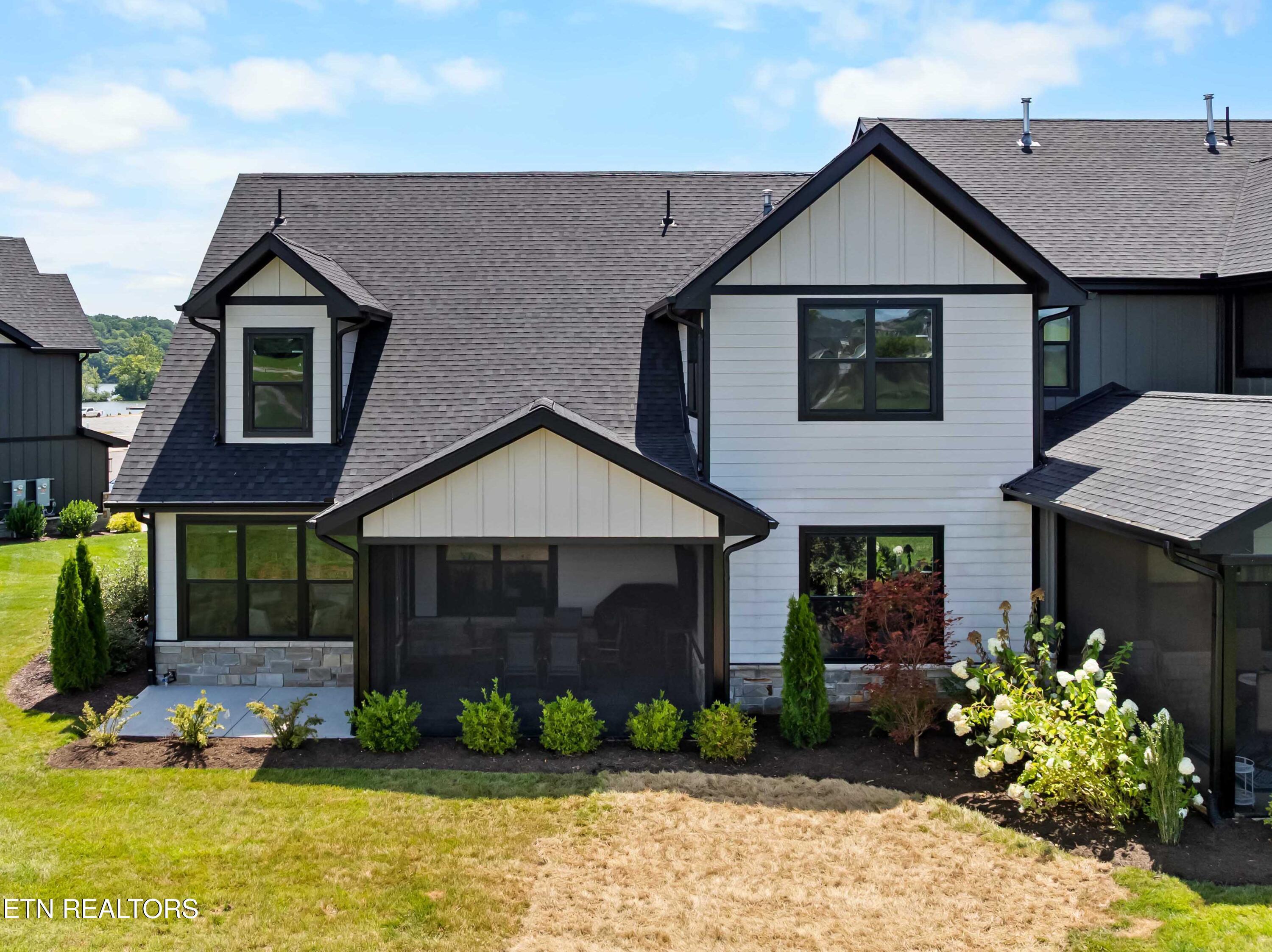 Image 2: back view of home