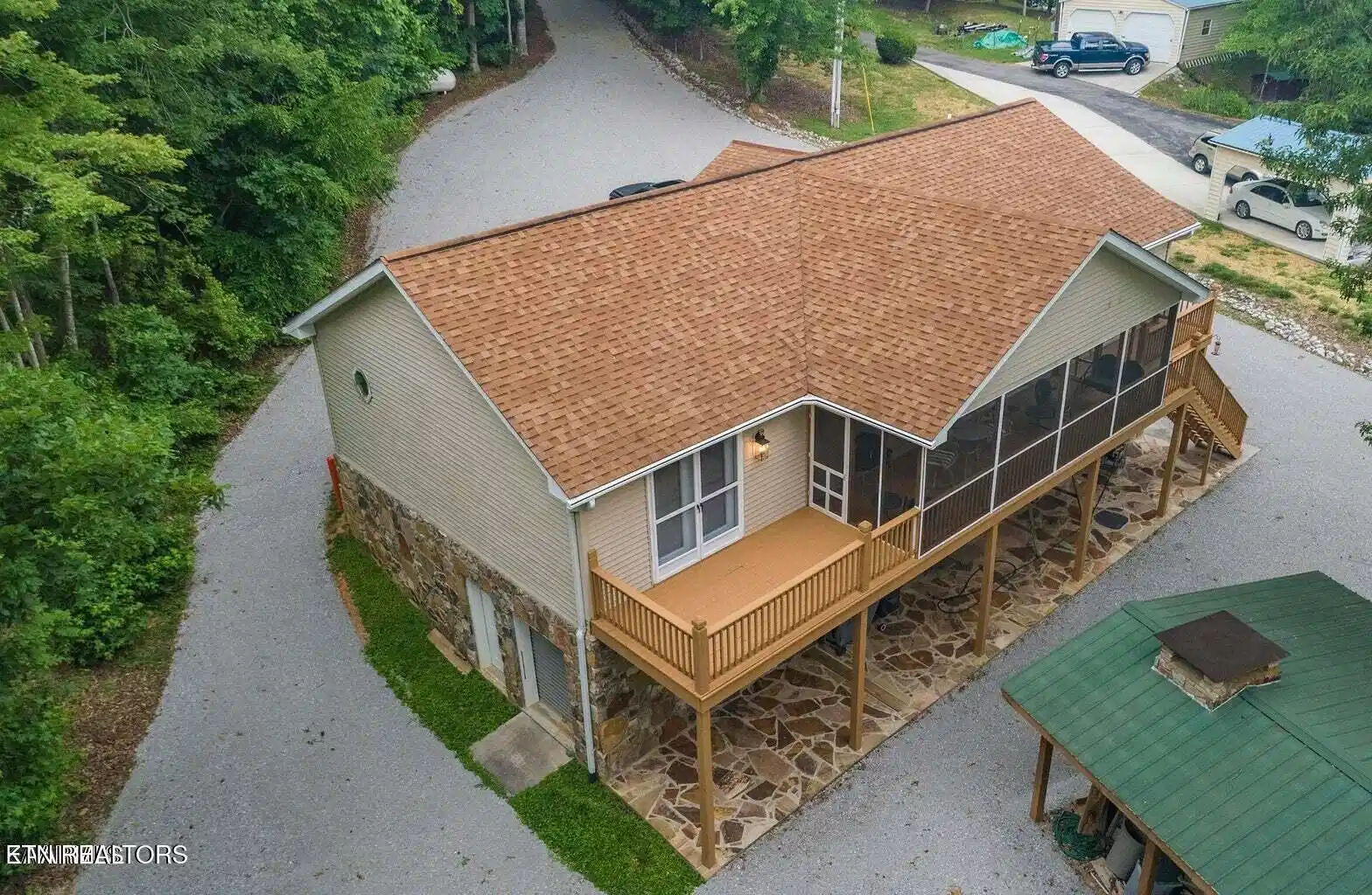 Image 1: Aerial of Back of Home