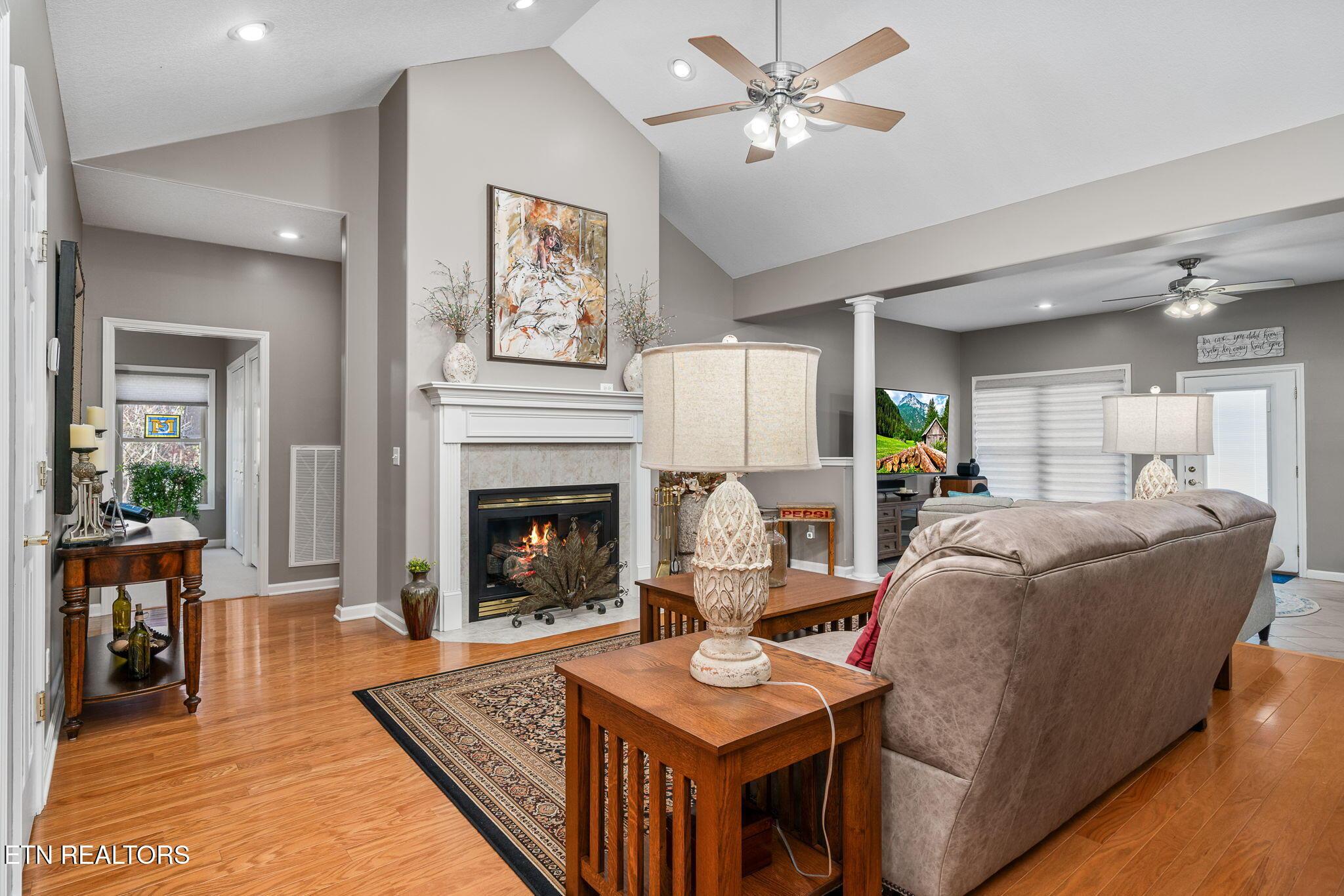 Image 3: Living Area with Vaulted Ceilings