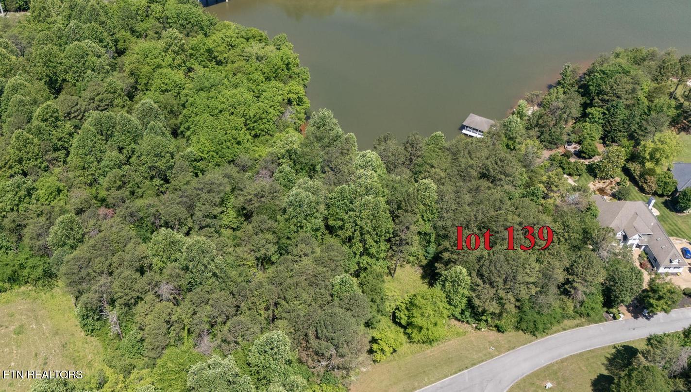Image 2: lot 139 to left of home