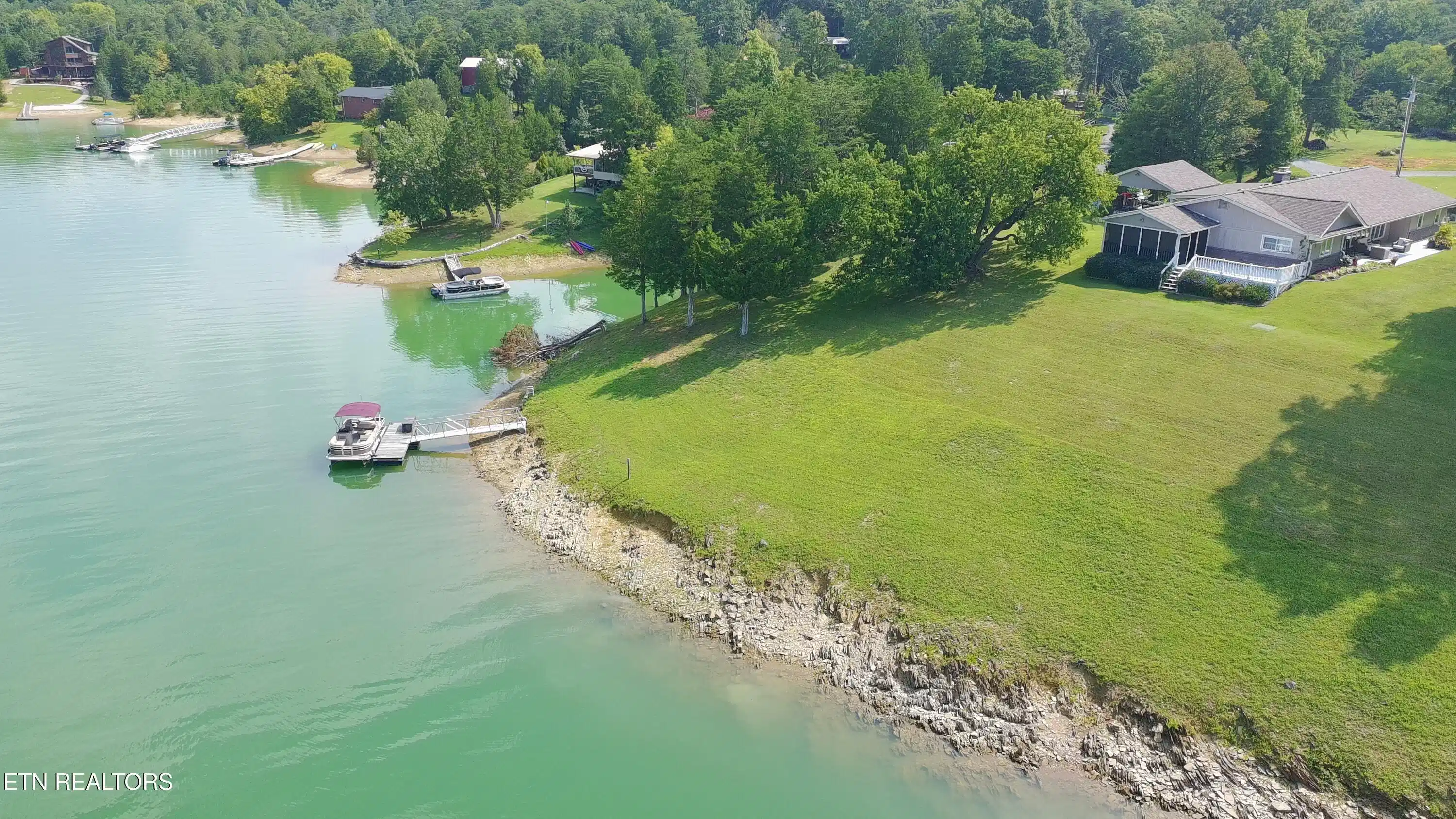 Image 1: Aerial View of House and Dock