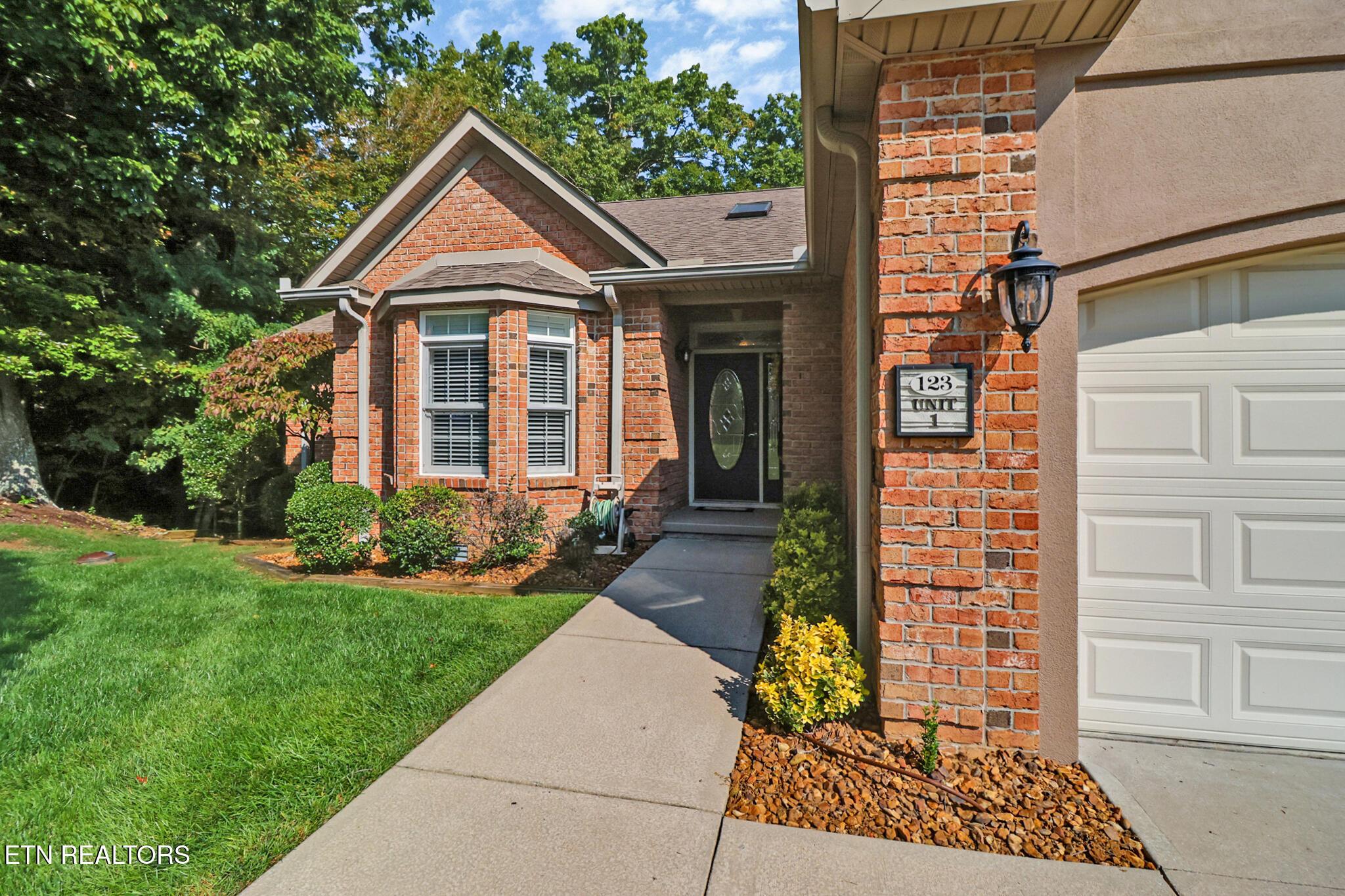 Image 4: All Brick and Stucco