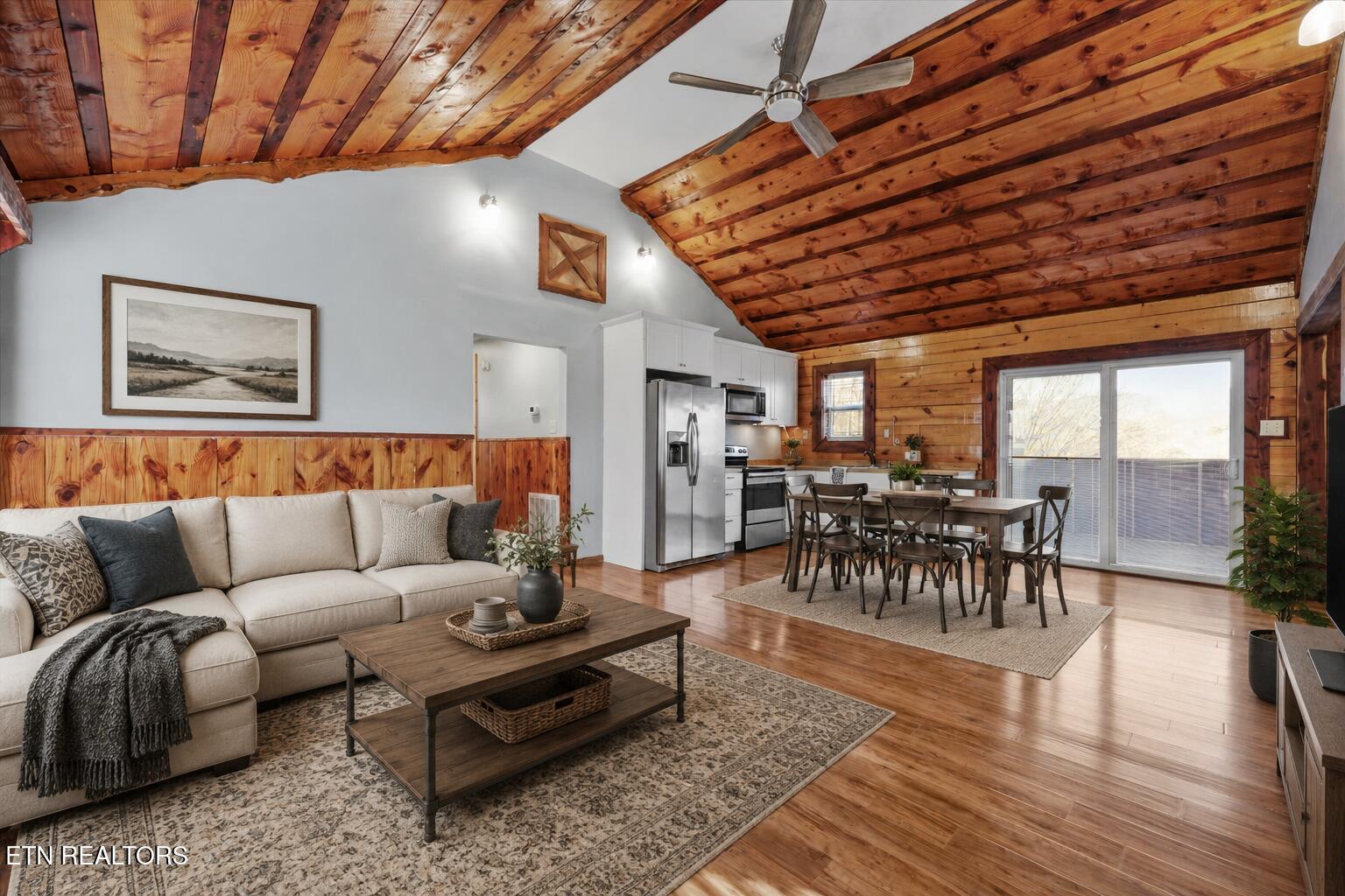 Image 3: VIRTUALLY STAGED Living room/kitchen
