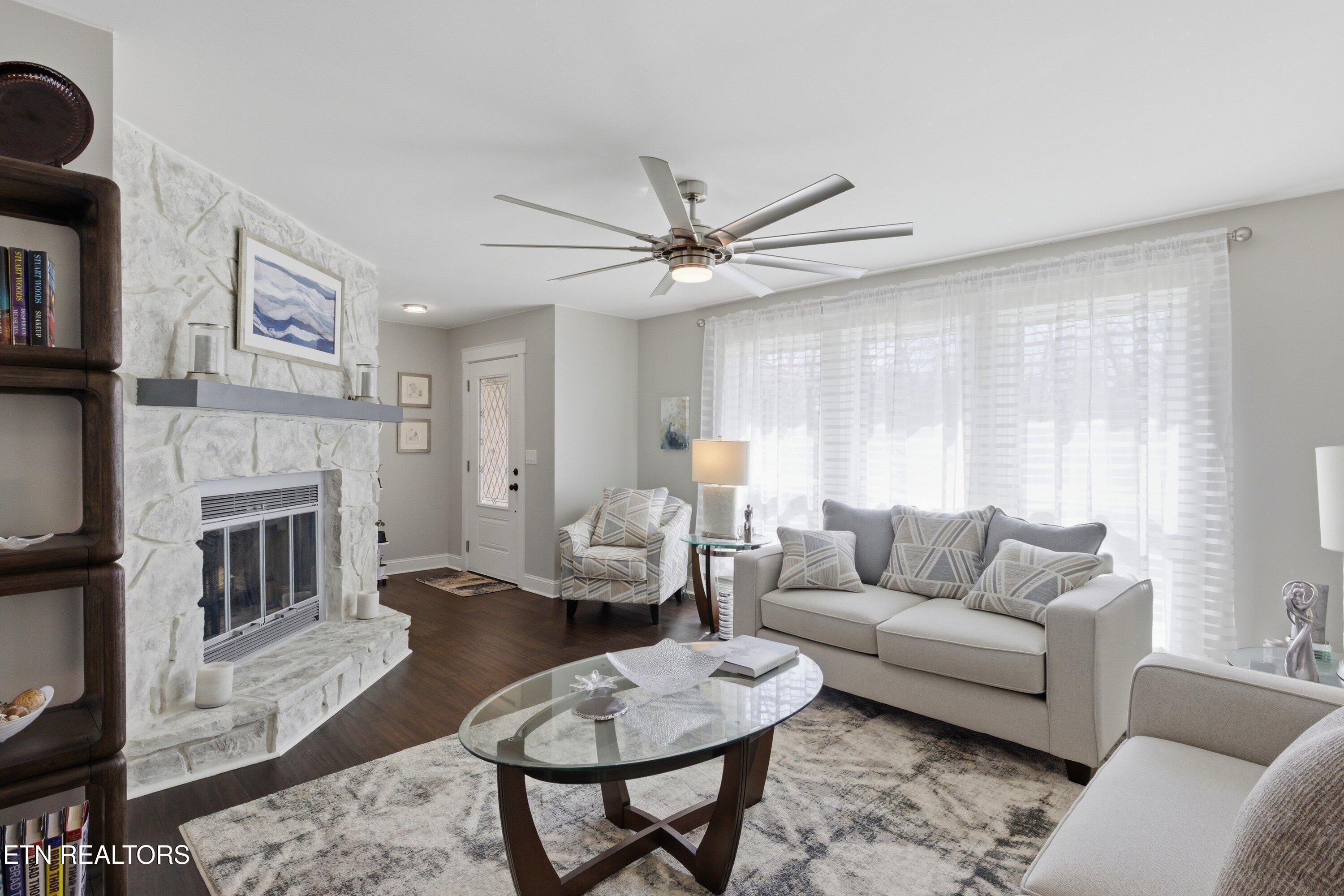 Image 2: Family Room w/wood burning fireplace