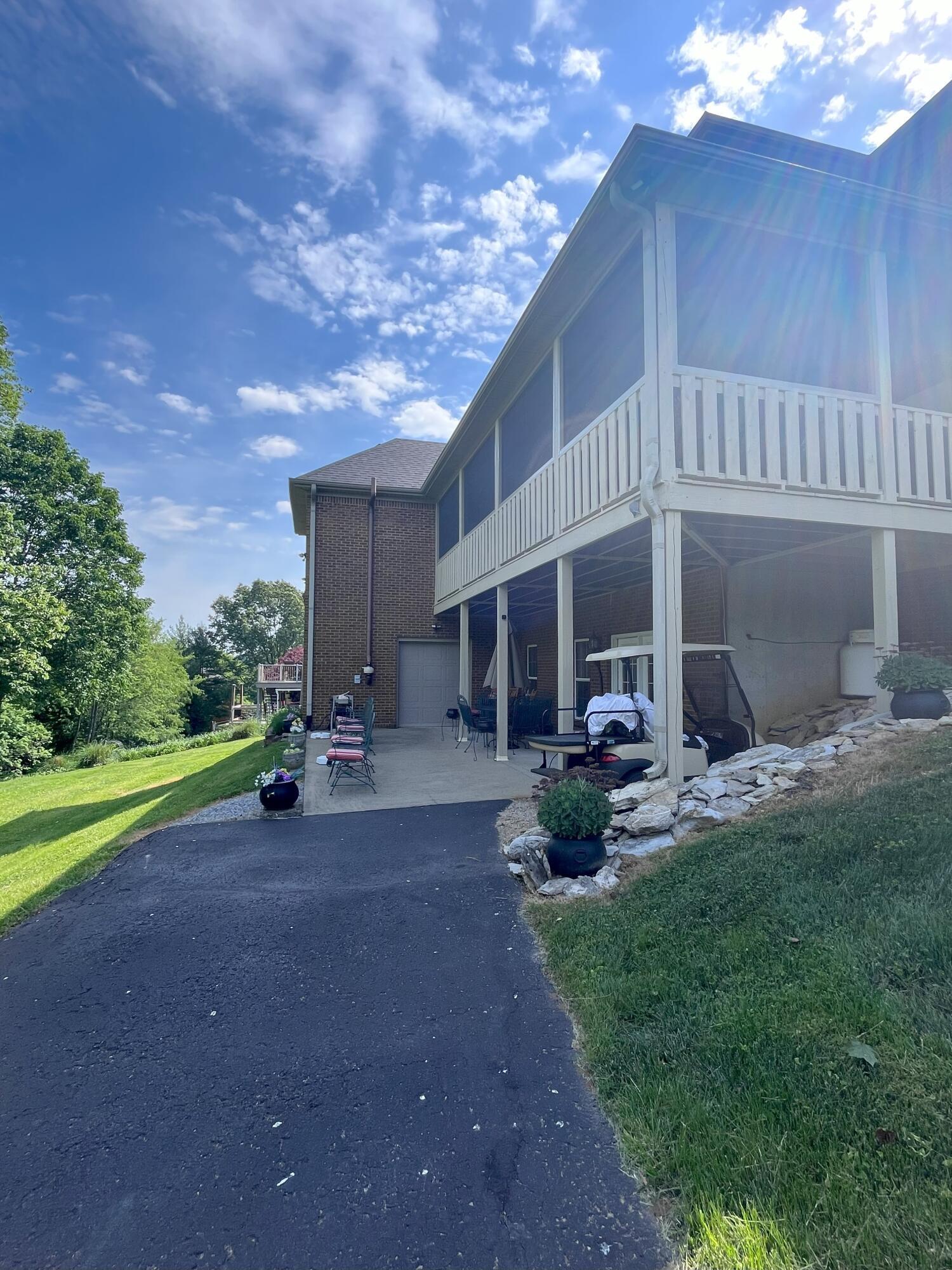 Image 4: 4 Back of House with Screened Porch