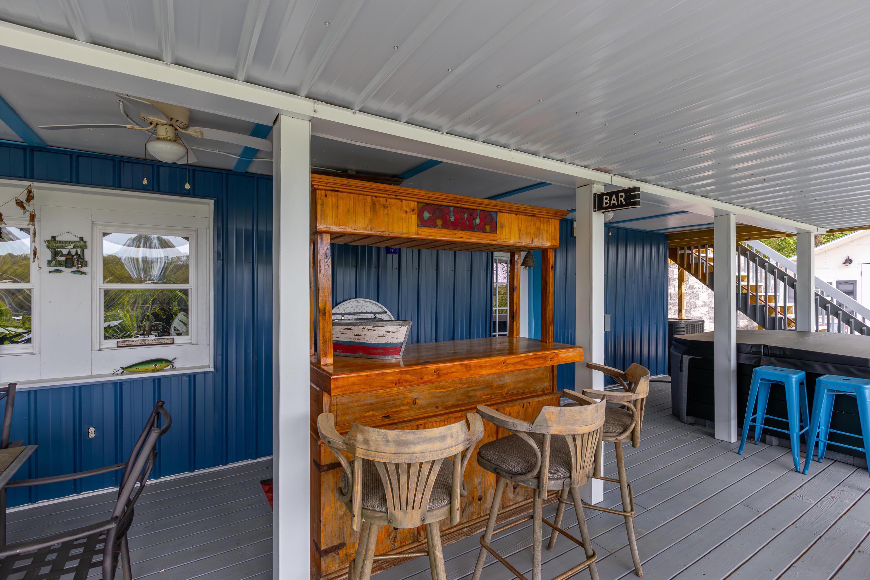 Image 2: Lower Deck with Bar & Hot Tub