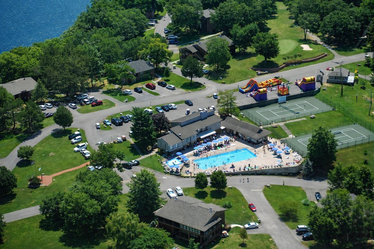 Image 3: Clubhouse, pool and tennis courts