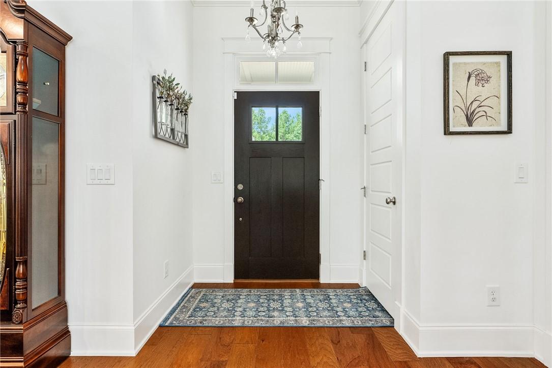 Image 4: Lovely entry - hard wood floors, 12 ft ceilings, c