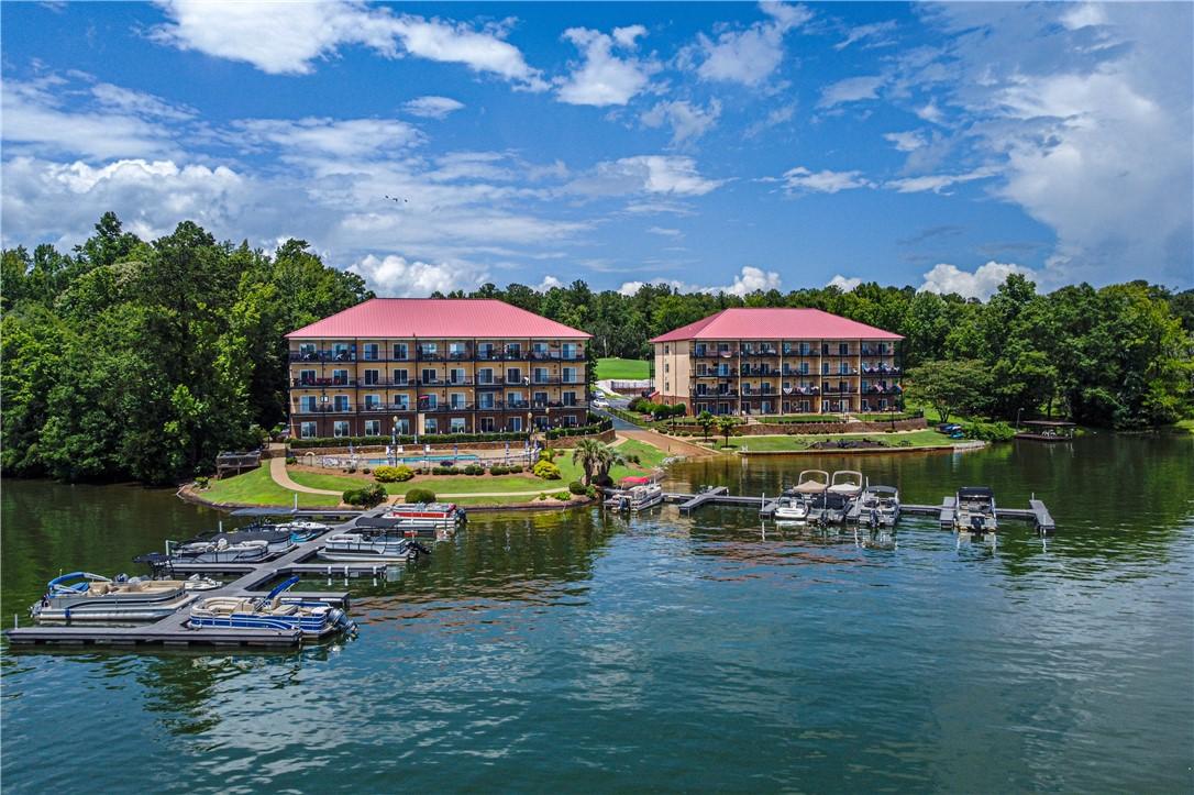 Image 4: Boasting waterfront residences with private boat s
