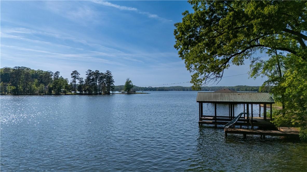 Image 3: This tranquil waterfront setting includes a privat