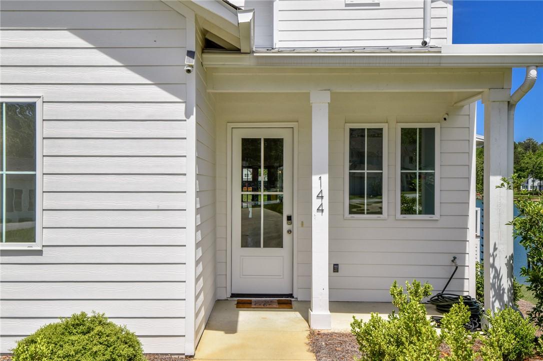 Image 3: This inviting home showcases a clean facade and am