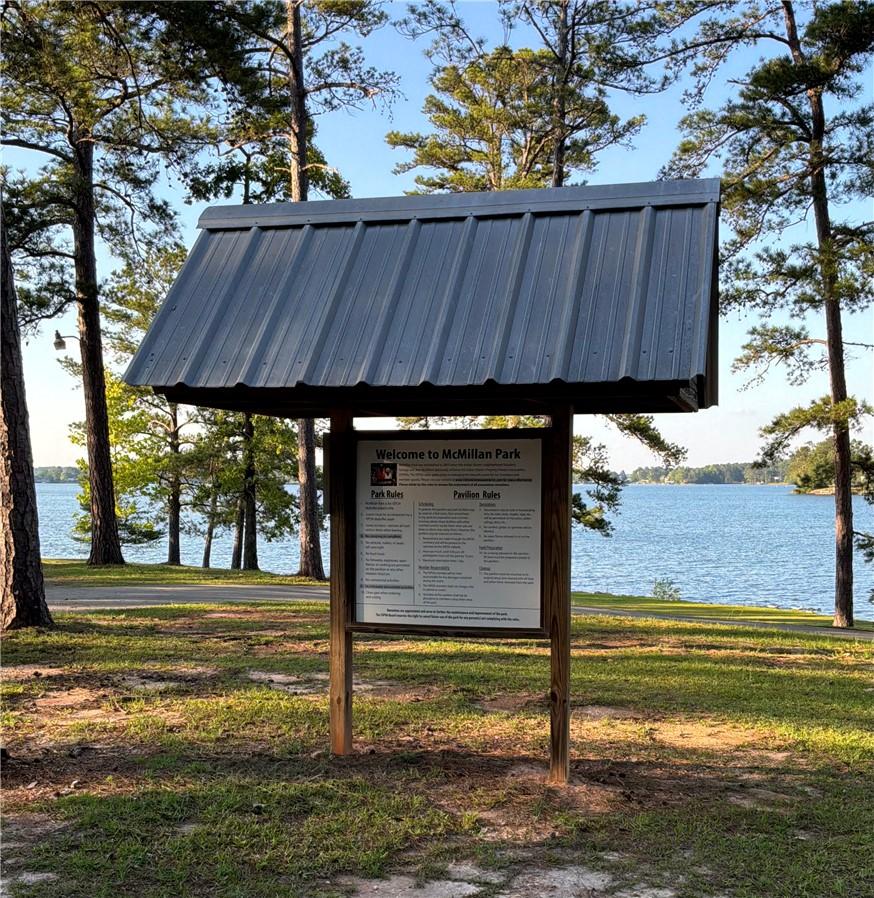 Image 2: This serene lakeside park offers lush surroundings