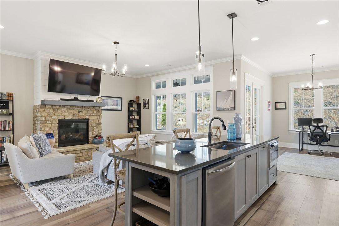 Image 4: Open-Concept Living Room, Kitchen, and Dining Room