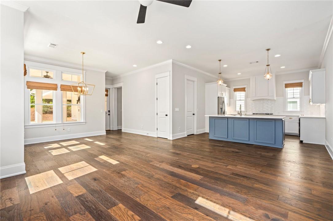Image 3: Open concept living is ideal for entertaining.