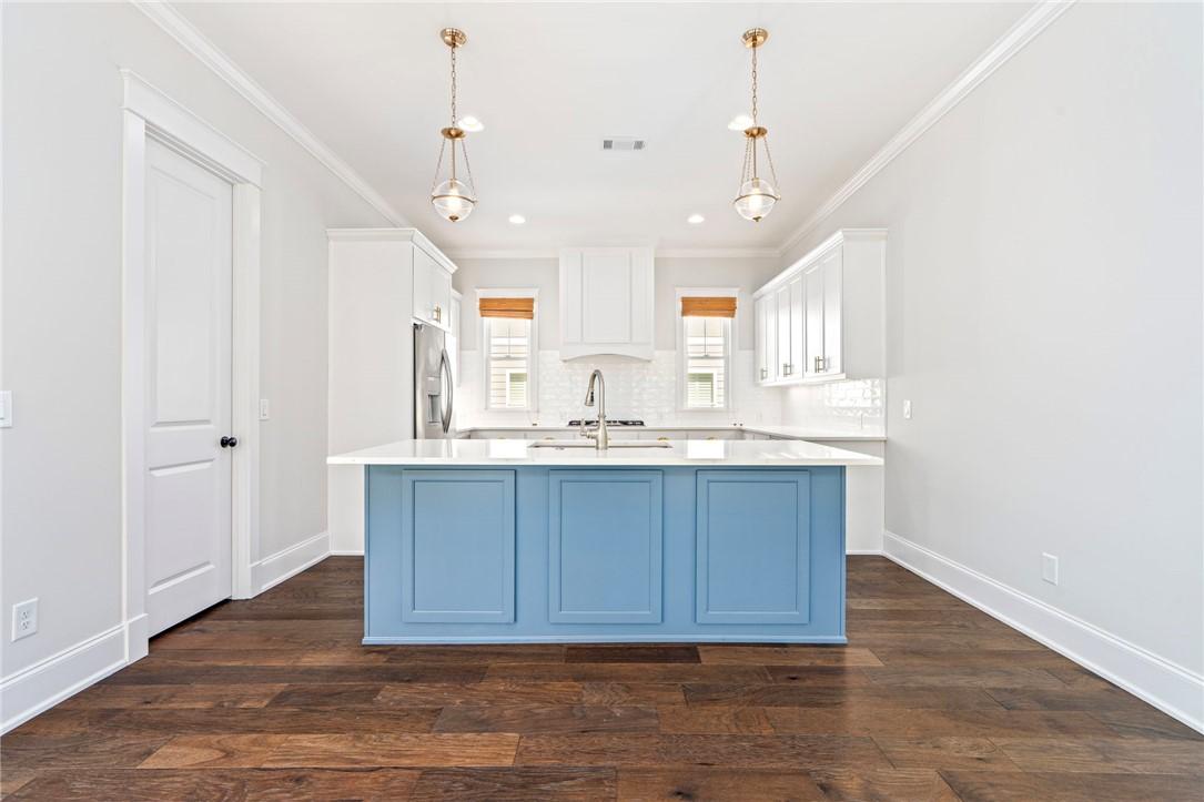 Image 4: The upscale kitchen steals the spotlight with its