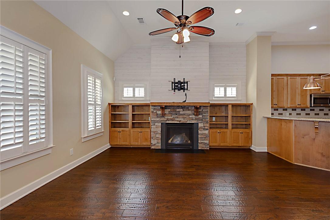 Image 3: Gas fireplace and built-in bookcases