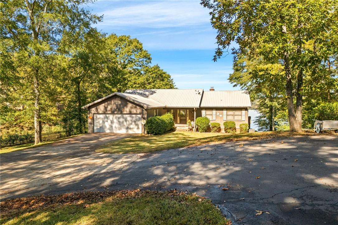 Image 3: All paved drive with extra parking