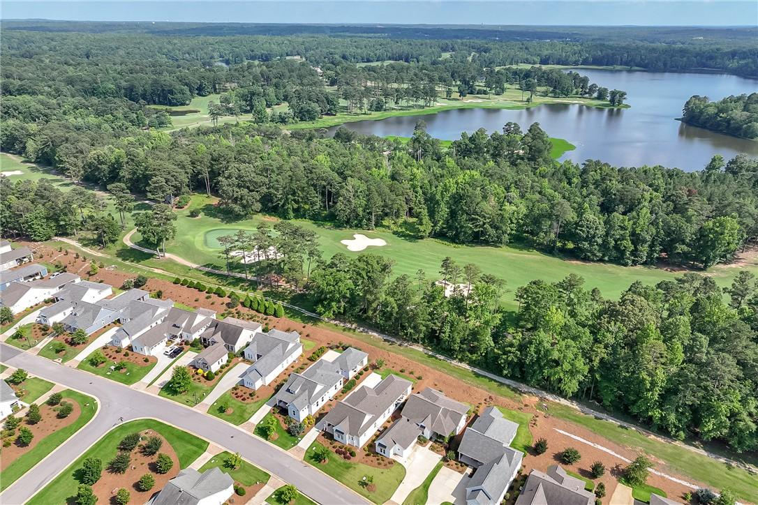 Image 2: An aerial perspective reveals a serene golf course