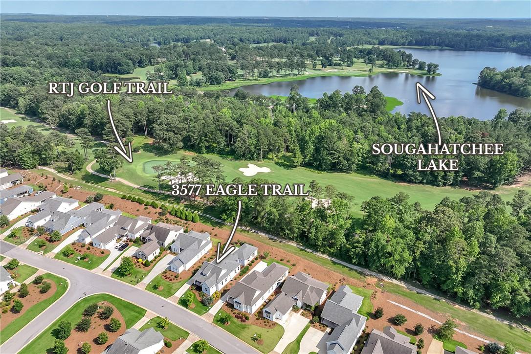 Image 3: An aerial perspective reveals a serene golf course