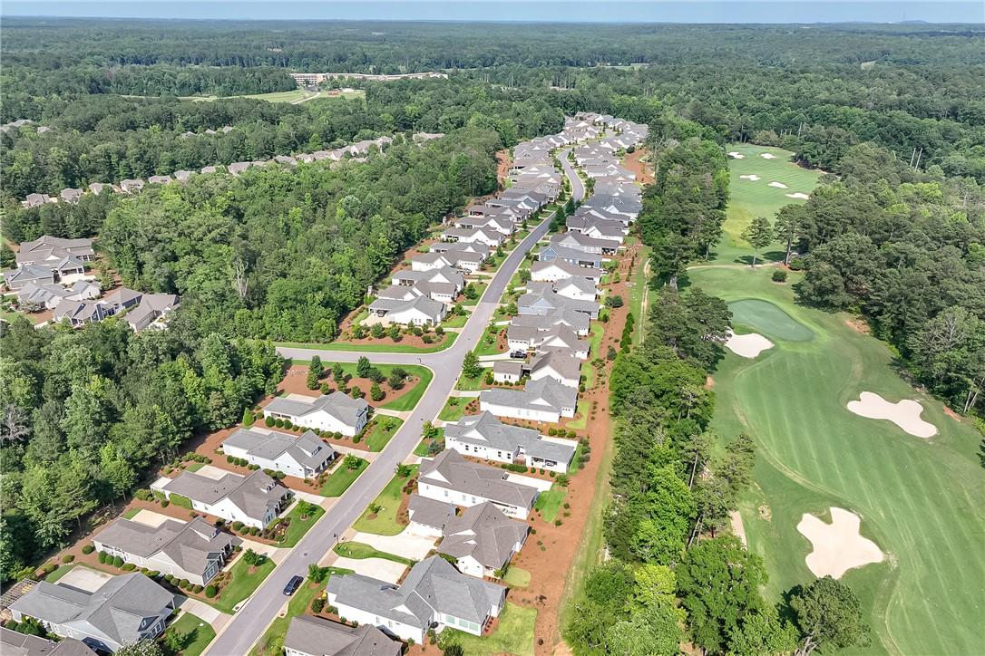 Image 4: An aerial panorama reveals a residential community