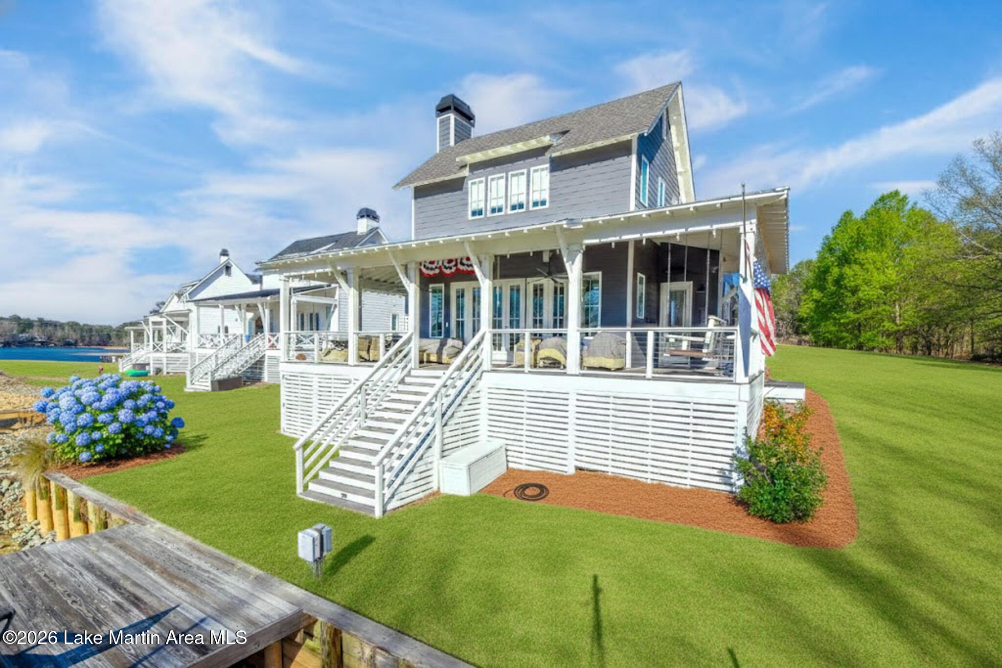 Image 1: Lakeside view of home