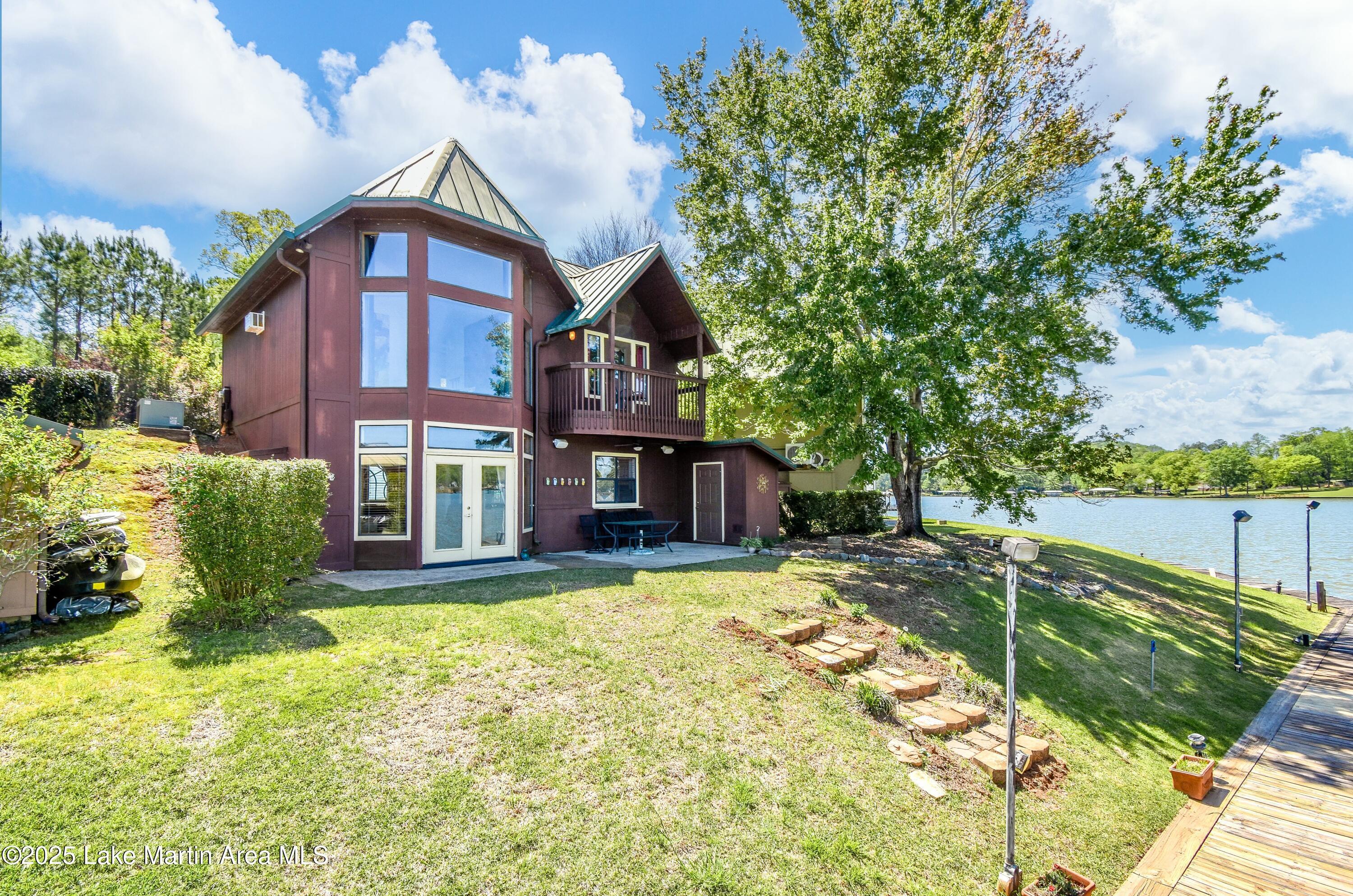Image 2: Lakeside view of home