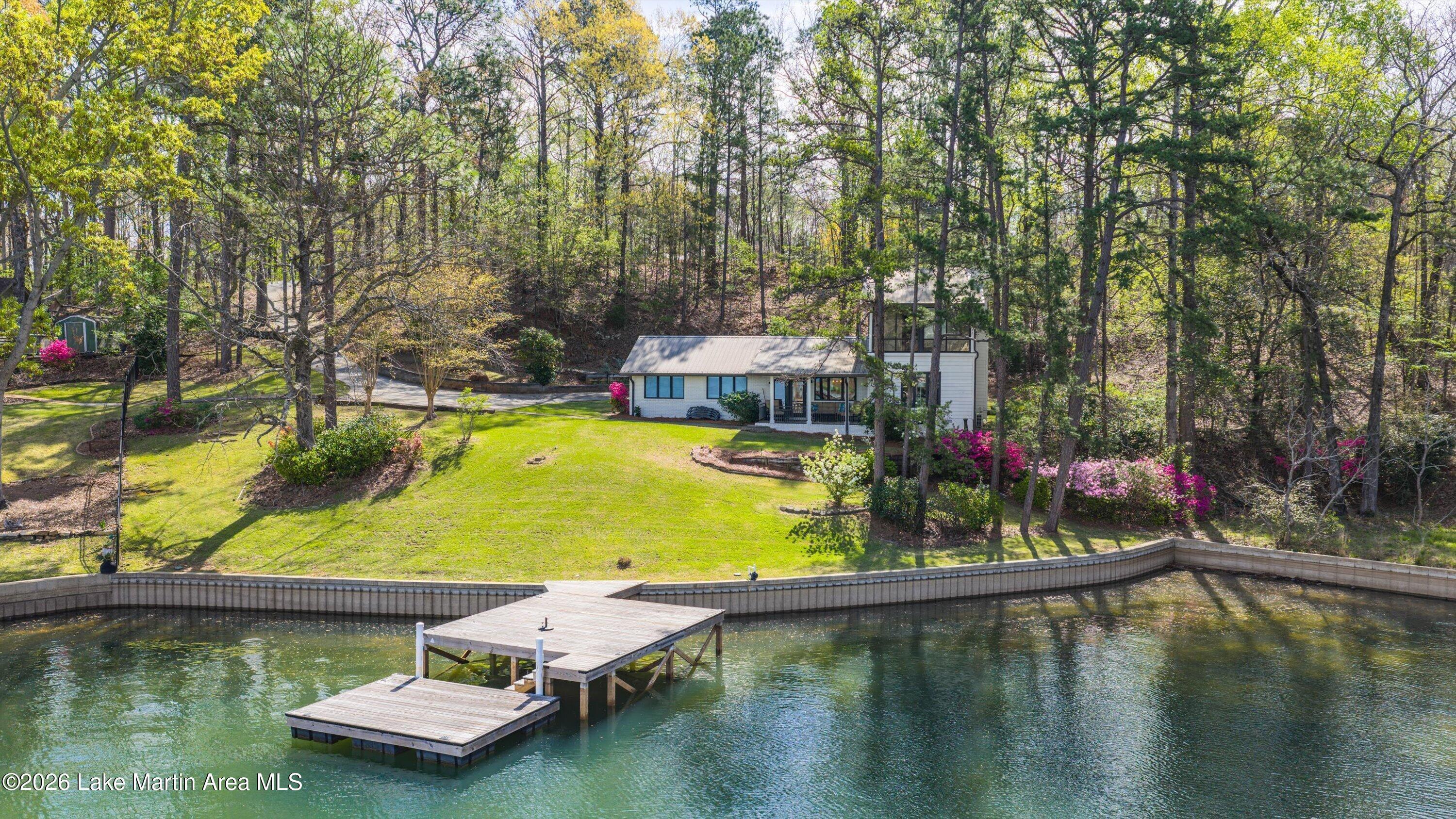 Image 2: Lakeside view of home