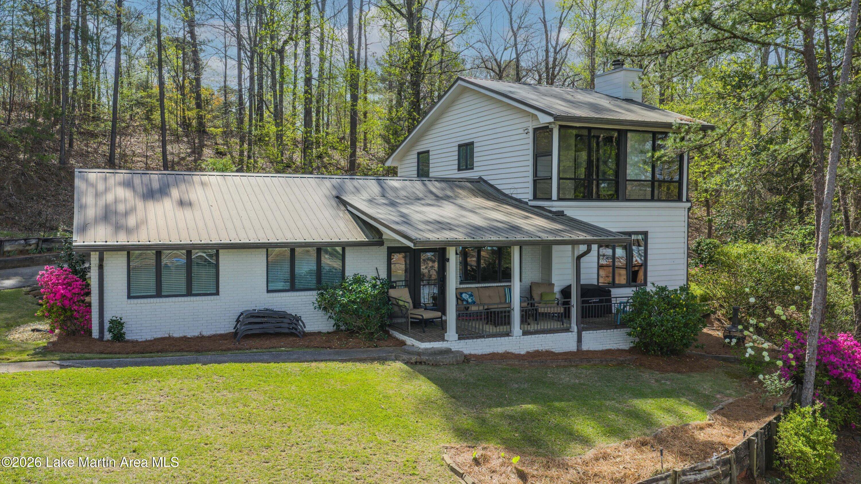 Image 3: Lakeside view of home