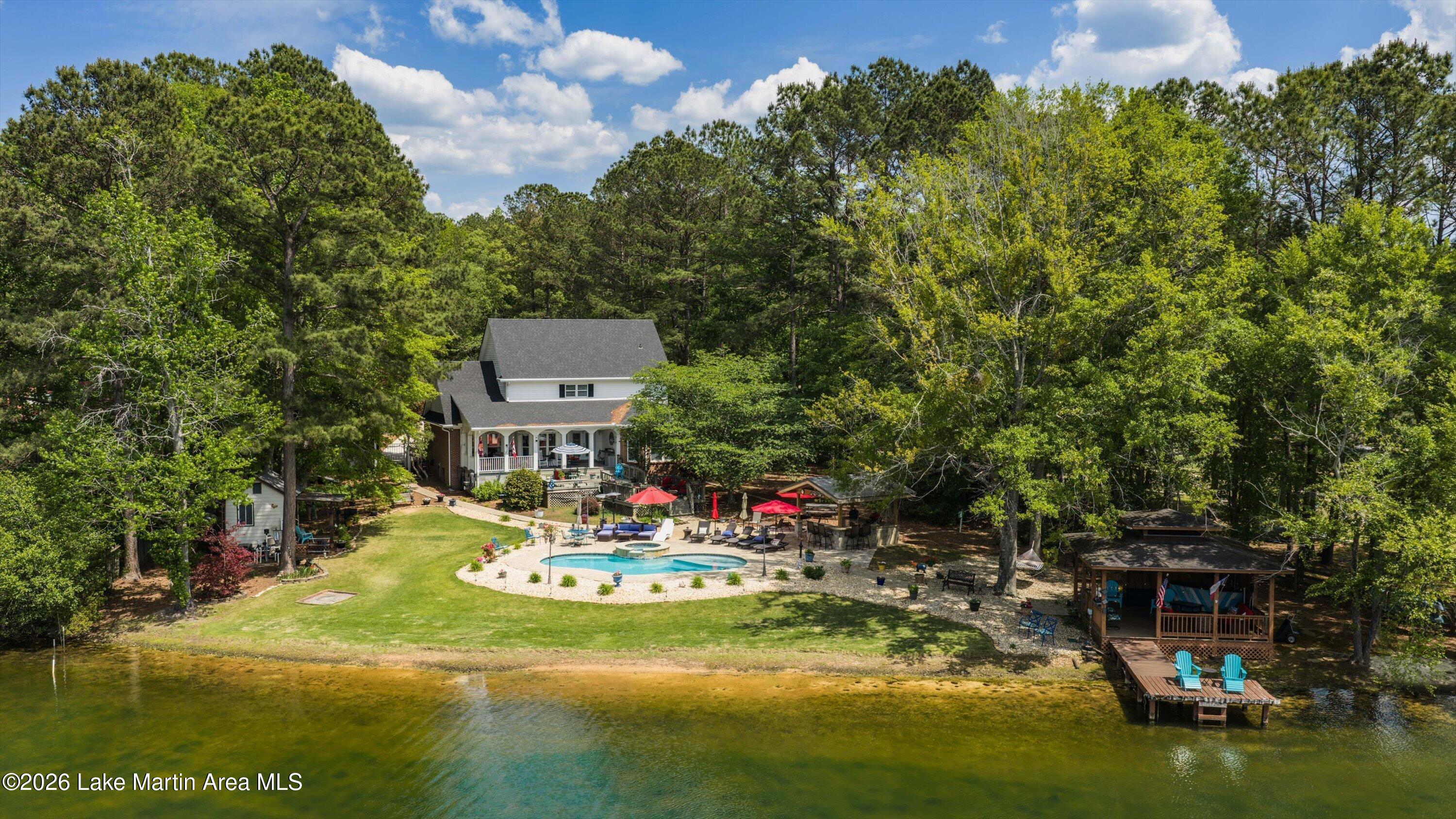 Image 1: Lakeside view of home