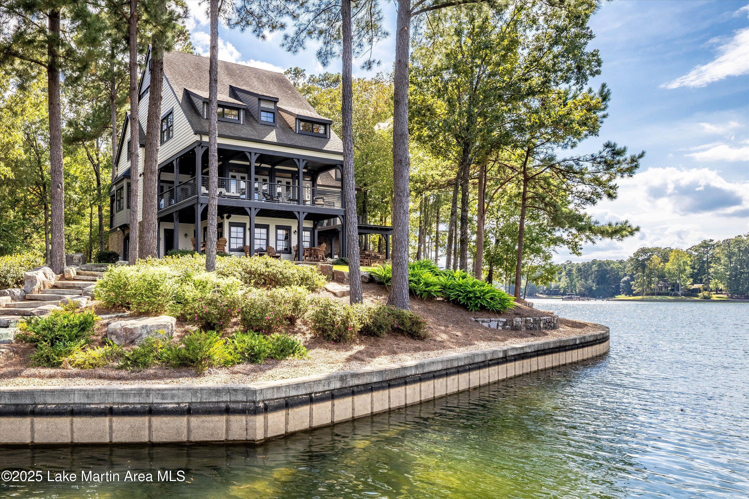Image 1: Lake side view of home