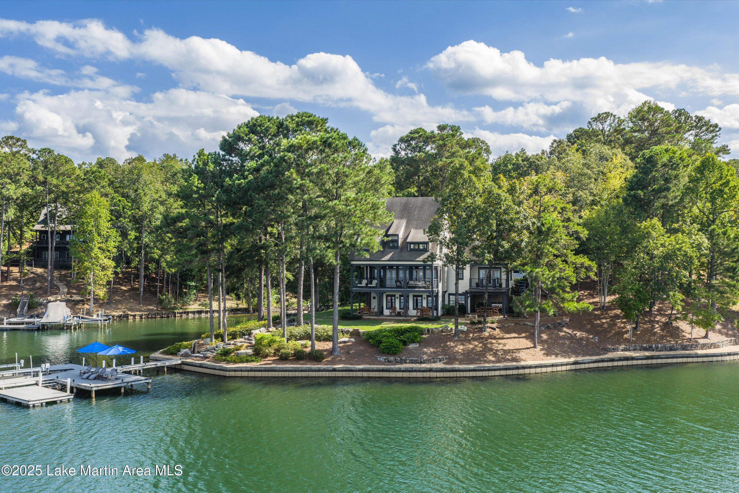 Image 2: Lake side view of home