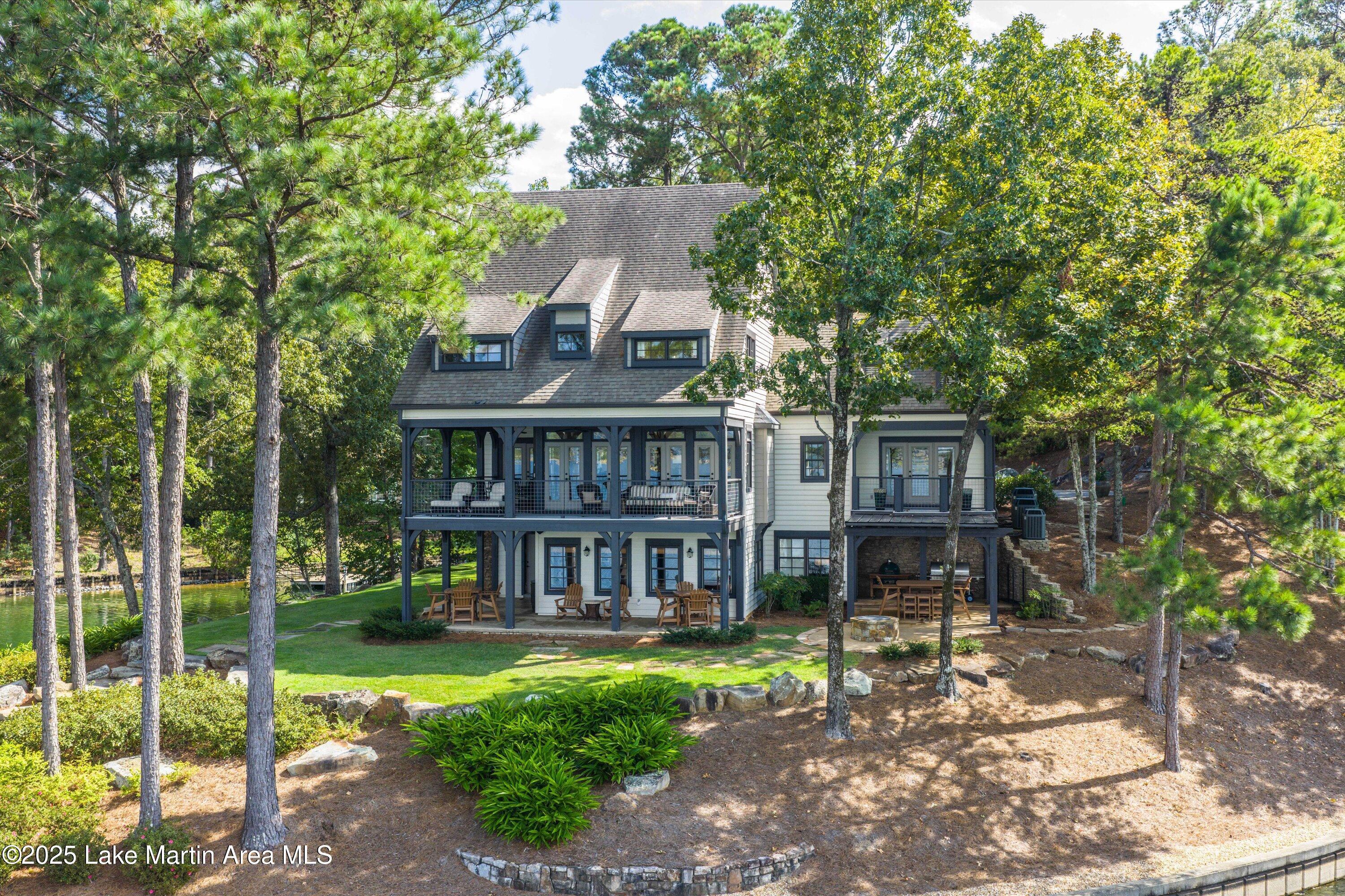 Image 4: Lake side view of home