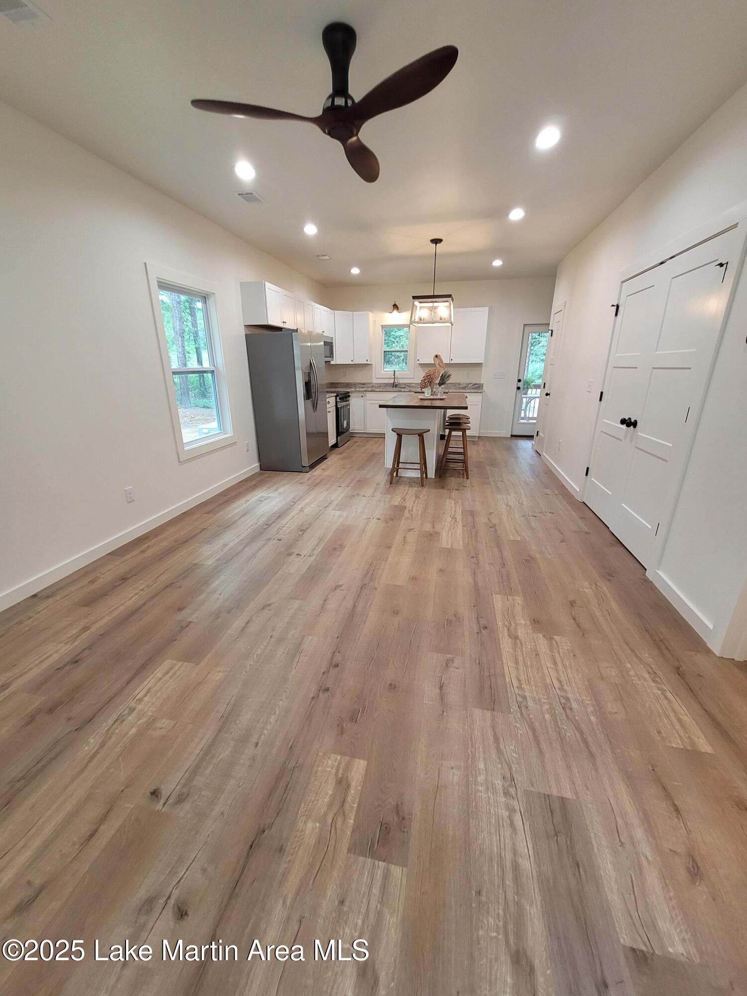 Image 3: Living Room to Kitchen