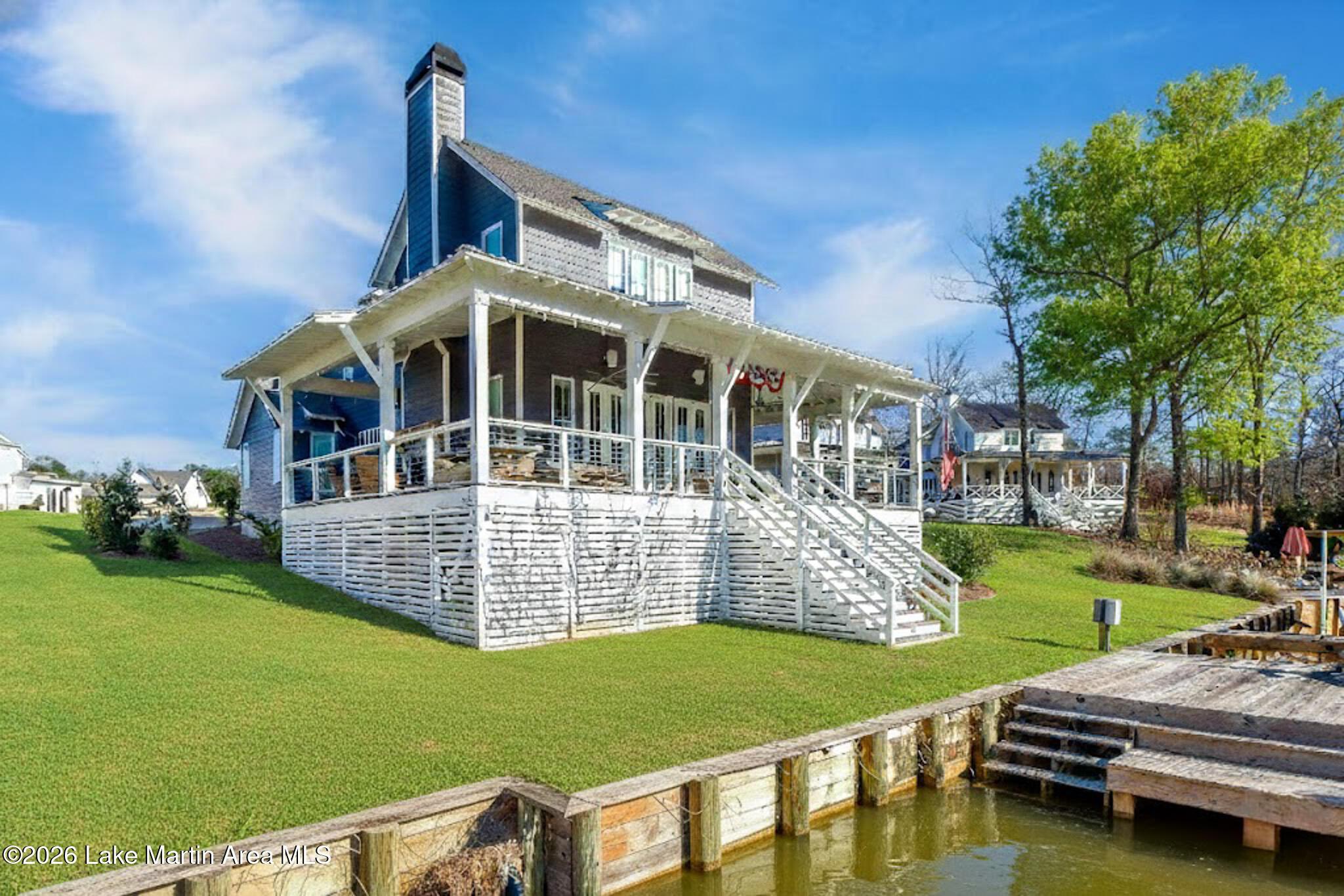 Image 1: Lakeside view of home