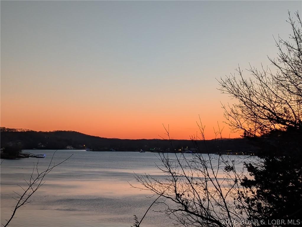 Image 2: Sunset at Lake House