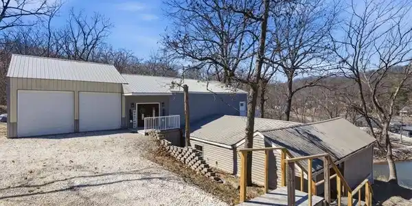 Image 3: Tall attached 2 car garage