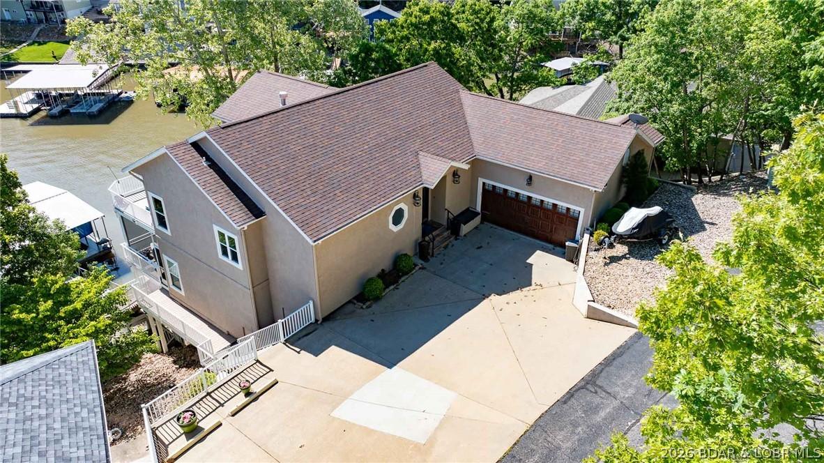 Image 3: Roadside view of driveway/parking/front door