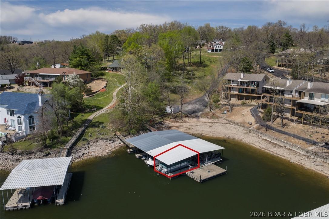 Image 3: You have a 10x26 slip in the community dock.