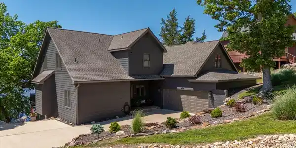 Image 2: New roof, Diamond Kote siding & trim and Andersen