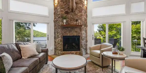 Image 4: Living room has lots of natural light through new