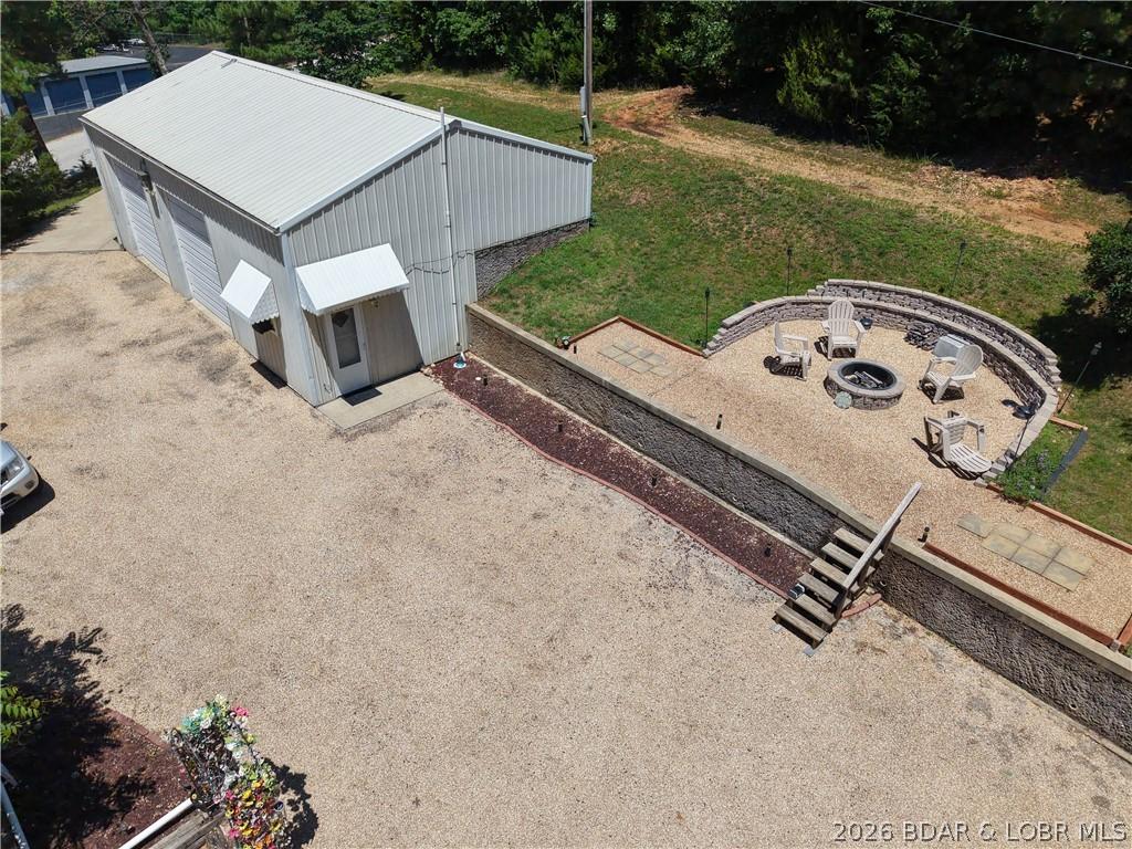 Image 4: The shop and firepit area.