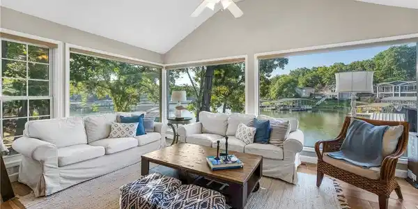 Image 2: The Lake becomes part of the house with walls of w