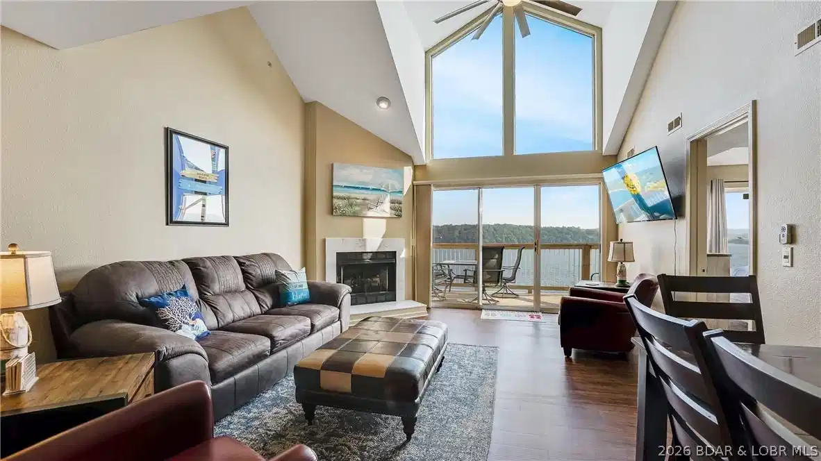 Image 1: Top floor unit with massive windows to enjoy the m