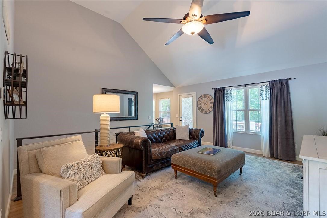 Image 4: Main level living area w/new flooring, paint, ligh
