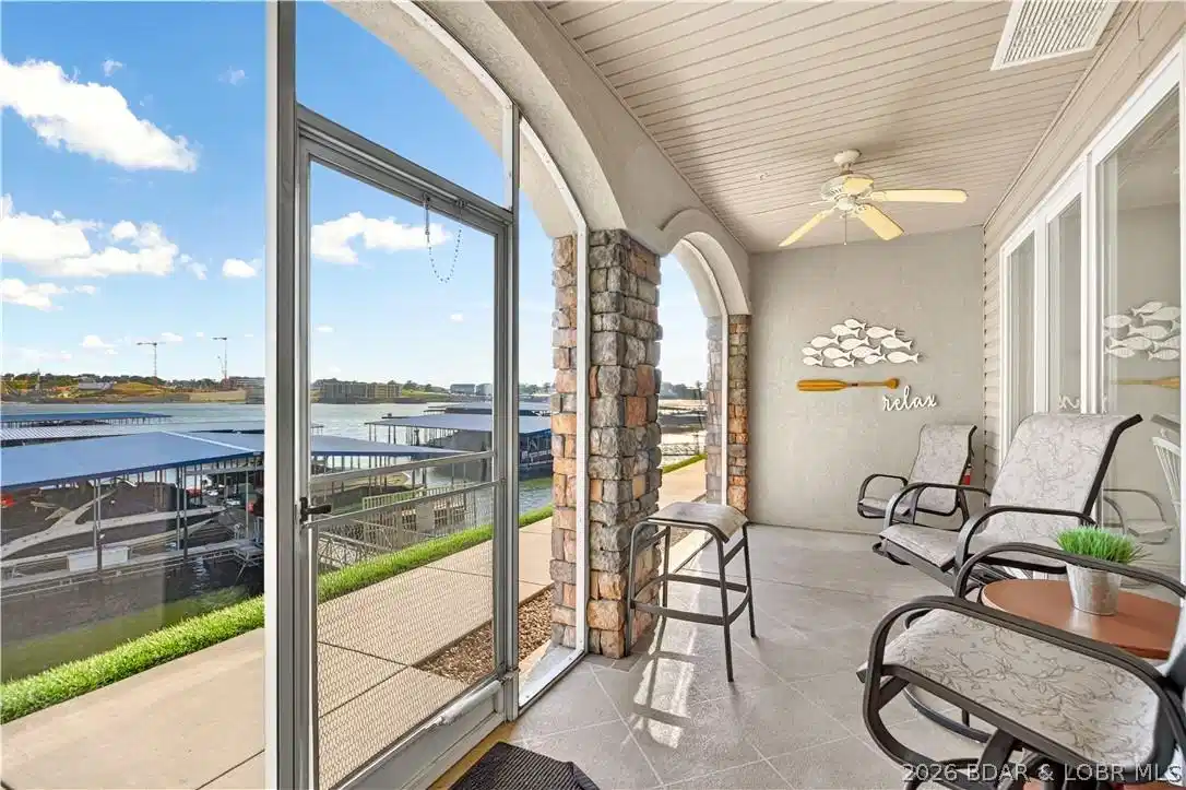 Image 1: Screened in porch walks right out to the docks