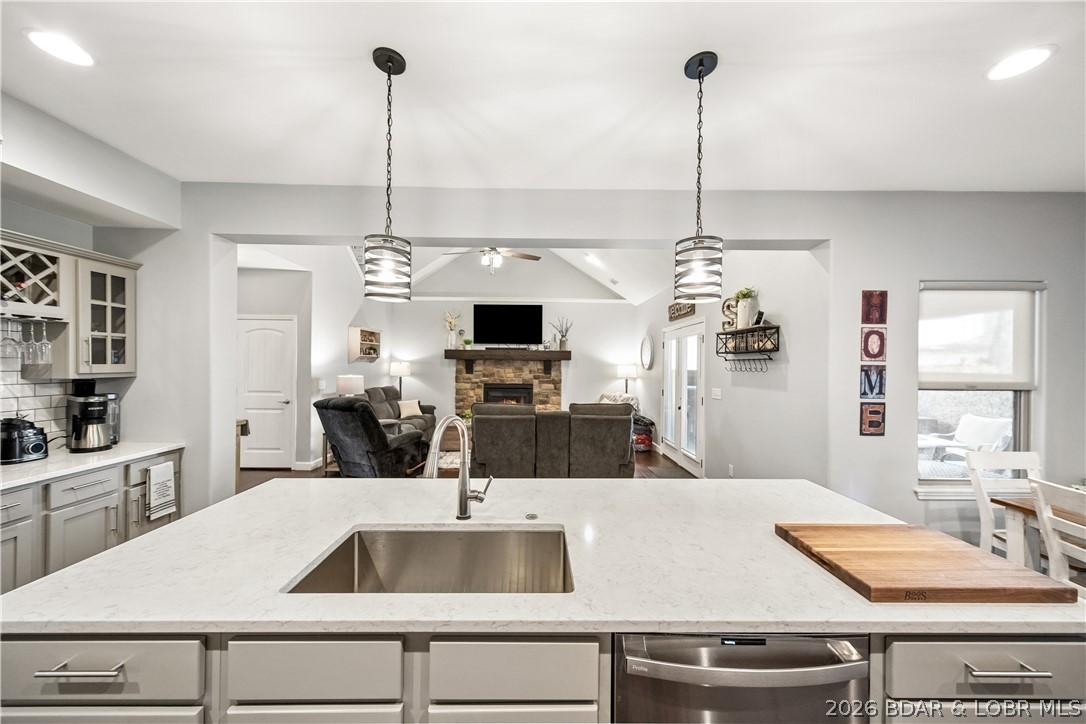 Image 3: The kitchen also features a huge center island wit