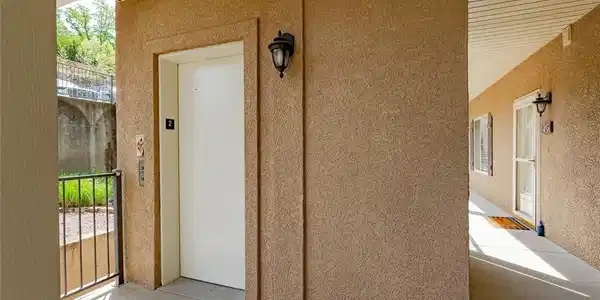 Image 2: Elevator to/from parking level.  10 ft to your doo