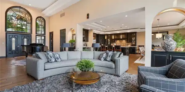 Image 4: Open-concept main level designed for effortless en