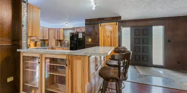Image 4: Kitchen and front entrance