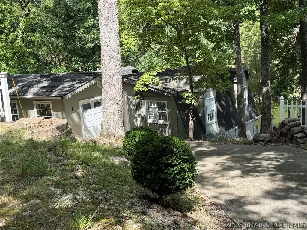 Image 1: Private driveway to garage